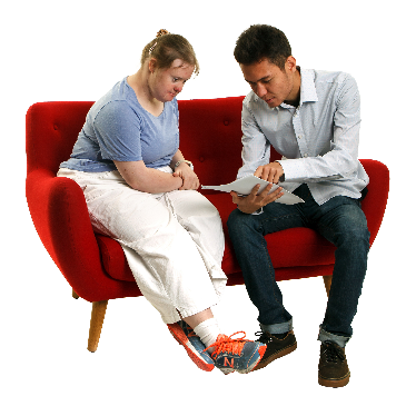 2 people looking at a document together.