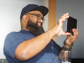 A man doing a video call on his phone.