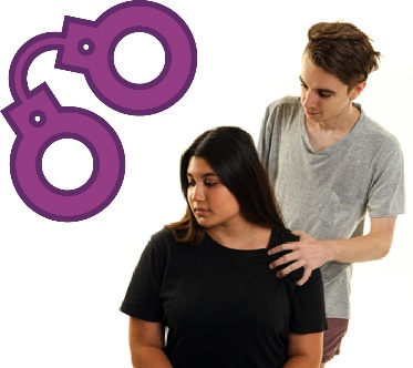 A pair of handcuffs next to 2 people, one person looks uncomfortable.