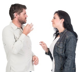 An NDIS worker and a person having a conversation using Auslan.
