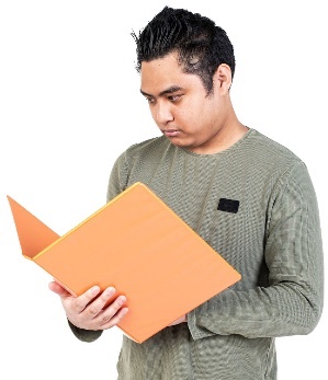 Bill looking at a document.