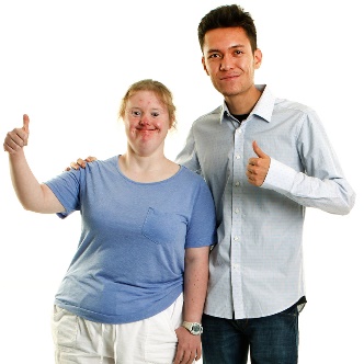 An NDIS worker supporting a participant. They are both giving thumbs ups.