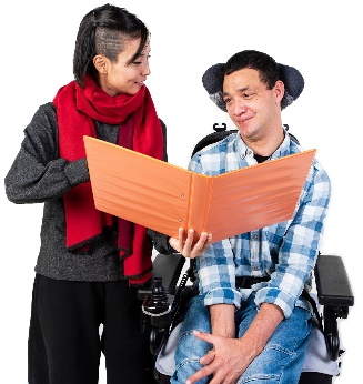 An NDIS worker showing a participant a document. 