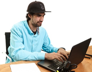 A participant using a laptop. 