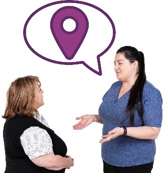 A participant and a support worker having a conversation. Above the participant is a speech bubble with a location icon inside it.