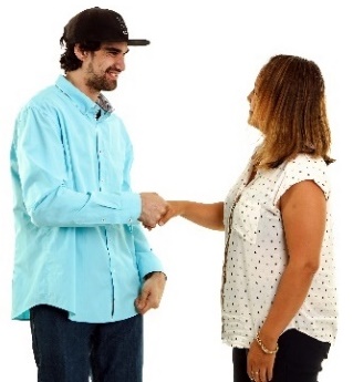 A participant and a support worker shaking hands.