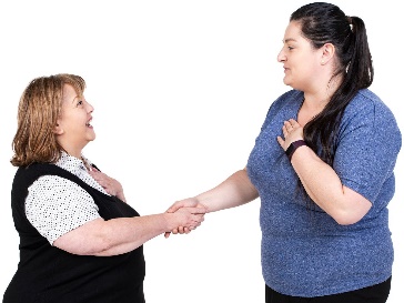 Jen and a support worker shaking hands.