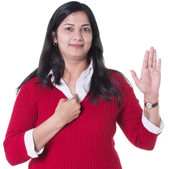 A participant pointing at themselves with their other hand raised.