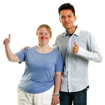 A worker supporting a participant. They are both giving a thumbs up.