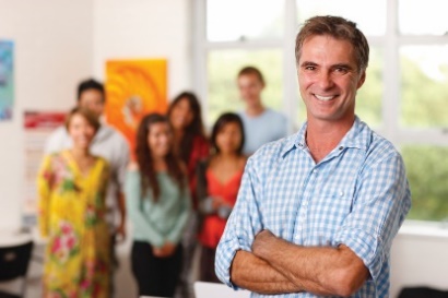 A leader in front of a group of workers.