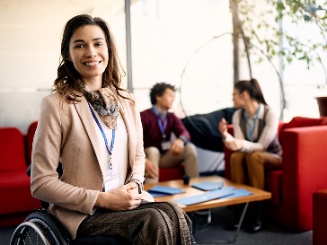 A person from ABC Supports in an office.