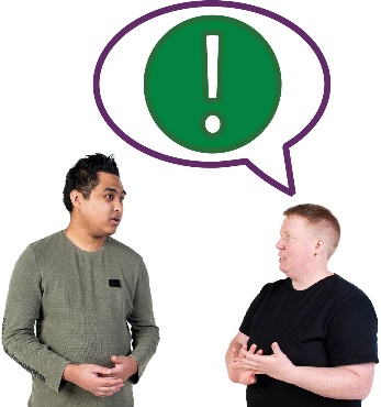 A participant and a worker having a conversation. Above the participant is an importance icon in a speech bubble.