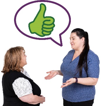 A participant and a worker having a conversation. Above the participant is a thumbs up in a speech bubble.