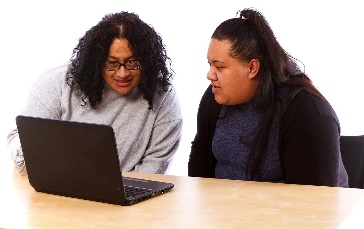 Effie and a service provider using a laptop together.