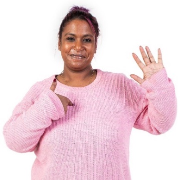 A participant pointing at themselves and raising their hand. 