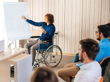 A person giving a presentation to a group of people.