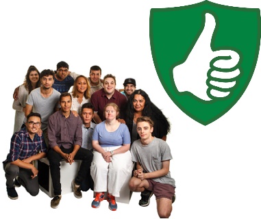 A group of people sitting and standing together and a safety icon.