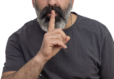 A person holding a finger up to their lips.