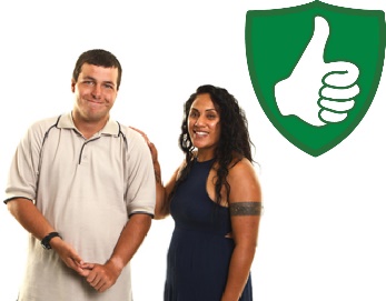 A woman supporting a man with her hand on his shoulder and a safety icon. 